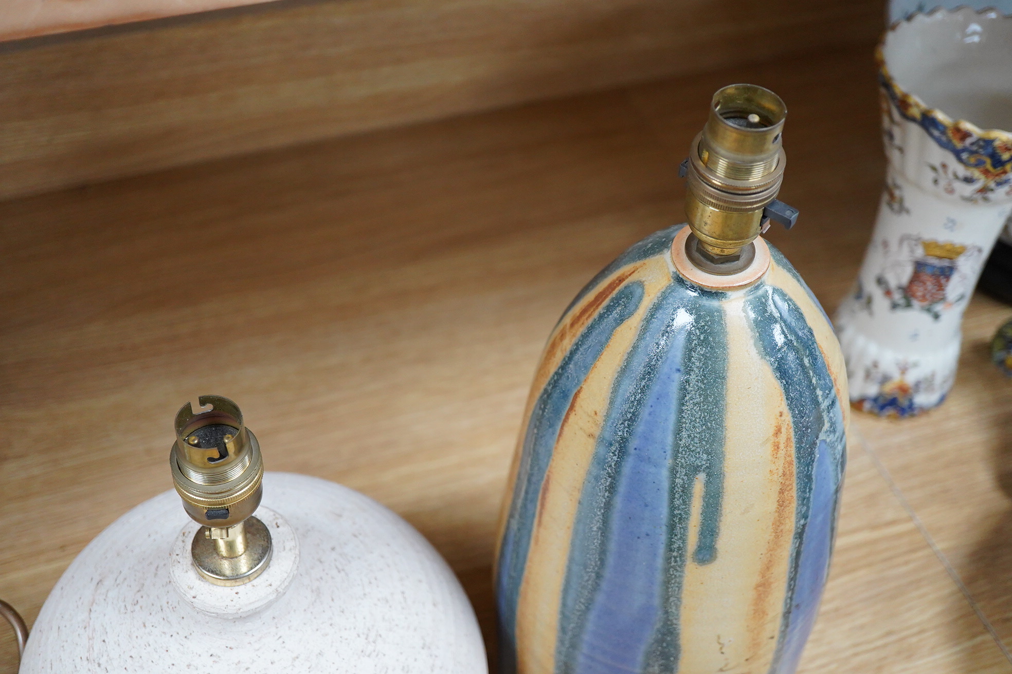 A 20th century Irish pottery lamp and another, tallest 34cm